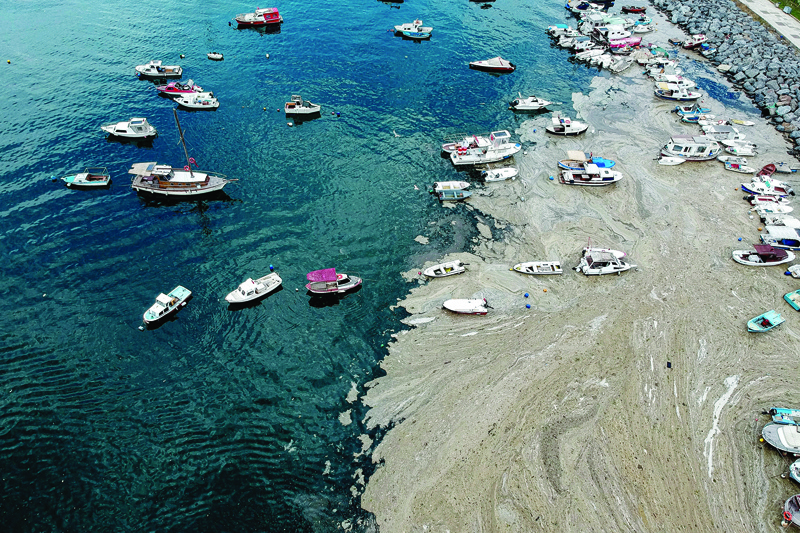 ISTANBUL: This aerial photograph taken on Friday shows mucilage in Marmara Sea at a harbor on the shoreline. - AFP n