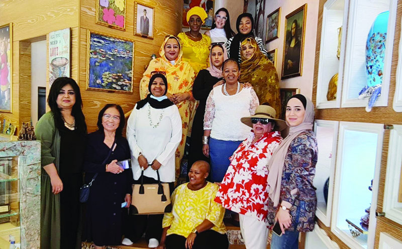 KUWAIT: Members of the Diplomatic Women's Committee pose for a group photo.n