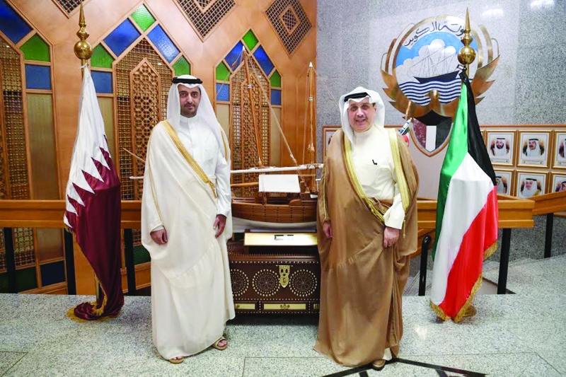 KUWAIT: Minister of Defense Sheikh Hamad Jaber Al-Ali Al-Sabah and Qatar Ambassador Bandar bin Mohammad Al-Attiya.