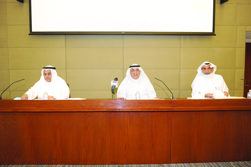 KUWAIT: Kuwait Chamber of Commerce and Industry Chief Mohammad Al-Sager addresses the assembly. - KUNAn