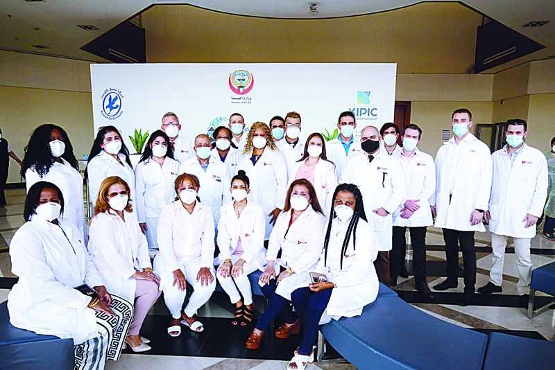 KUWAIT: Members of the Cuban medical team in a group photo yesterday. - Photo by Yasser Al-Zayyatn
