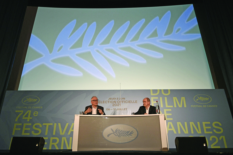 Cannes film festival general delegate Thierry Fremaux (left) and French director of the Cannes film festival Pierre Lescure attend a press conference, in Paris, yesterday, to announce the Official Selection of the 74th Cannes Film Festival to be held from July 6 until July 17, 2021. — AFPn