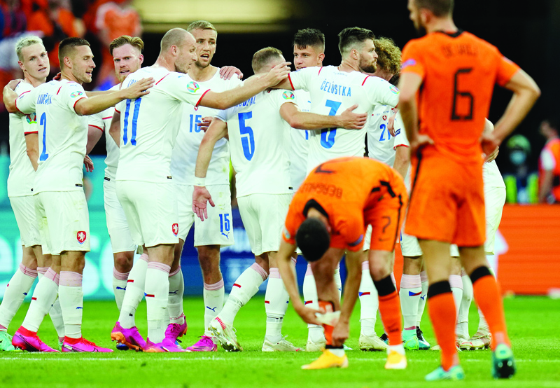 BUDAPEST: Czech Republic's players celebrate at the end of the UEFA EURO 2020 round of 16 football match between the Netherlands and the Czech Republic at Puskas Arena in Budapest yesterday. - AFPn