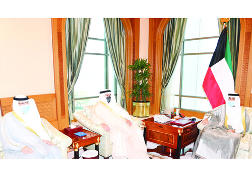 KUWAIT: His Highness the Amir Sheikh Nawaf Al-Ahmad Al-Jaber Al-Sabah meets Minister of Education Dr Ali Al-Mudhaf and the ministry's new Undersecretary Ali Al-Yaqoub. - Amiri Diwan and KUNA photos