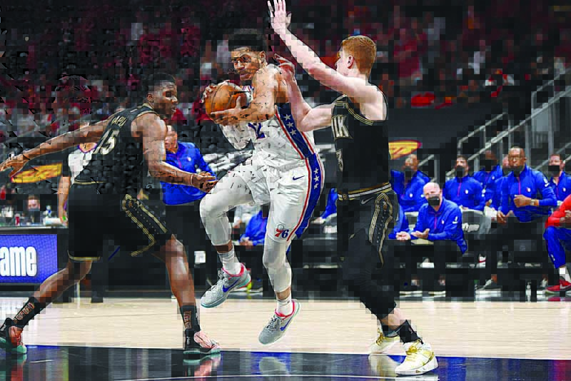 ATLANTA: Tobias Harris #12 of the Philadelphia 76ers drives to the basket against the Atlanta Hawks during Round 2, Game 4 of the Eastern Conference Playoffs on Monday at State Farm Arena. - AFP n