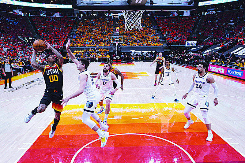 SALT LAKE CITY: Jordan Clarkson #00 of the Utah Jazz shoots the ball against the Memphis Grizzlies during Round 1, Game 5 of the 2021 NBA Playoffs on Wednesday. - AFP n