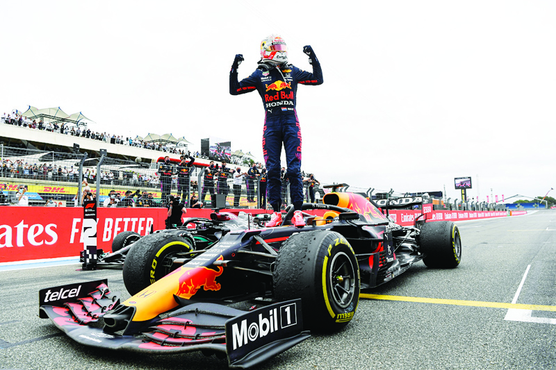 LE CASTELLET: Winner Red Bull's Dutch driver Max Verstappen celebrates after crossing the finish line during the French Formula One Grand Prix at the Circuit Paul-Ricard in Le Castellet, southern France, on June 20, 2021. - AFPn