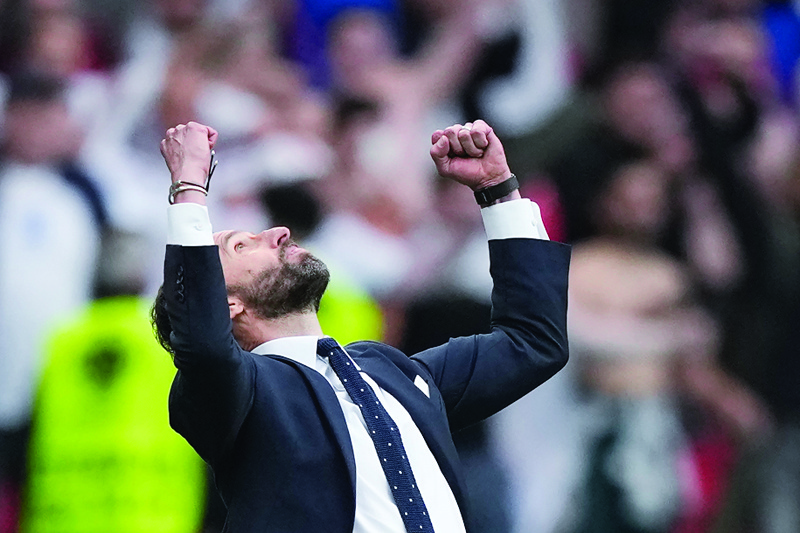 LONDON: England's coach Gareth Southgate celebrates his team's victory at the end of the Euro 2020 round of 16 football match between England and Germany at Wembley Stadium in London on Tuesday. - AFPn