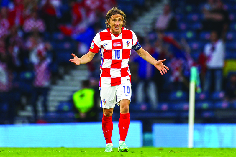 GLASGOW: Croatia's midfielder Luka Modric celebrates after scoring the second goal during the UEFA EURO 2020 Group D football match between Croatia and Scotland at Hampden Park in Glasgow on Tuesday. - AFPn