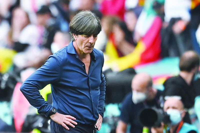 LONDON: Germany's coach Joachim Loew reacts during the Euro 2020 round of 16 football match between England and Germany at Wembley Stadium in London on Tuesday. - AFPn
