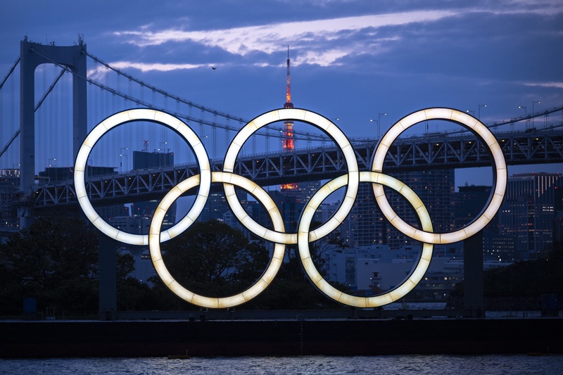 TOKYO: In this file photo a general view shows the Olympic rings lit up at dusk on the Odaiba waterfront in Tokyo on April 28, 2021. – AFPn