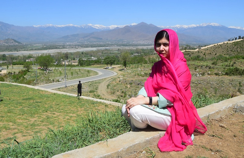 In this file photo, Pakistani activist and Nobel Peace Prize laureate Malala Yousafzai poses for a photograph at all-boys Swat Cadet College Guli Bagh, near  Mingora.- AFPn