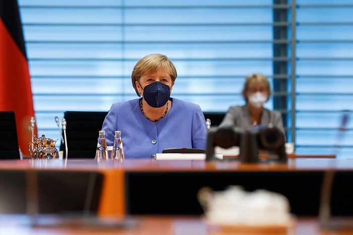 Berlin: German Chancellor Angela Merkel looks on prior to the weekly cabinet meeting at the Chancellery in Berlin, Germany, on July 21, 2021. / AFP / POOL / AXEL SCHMIDT