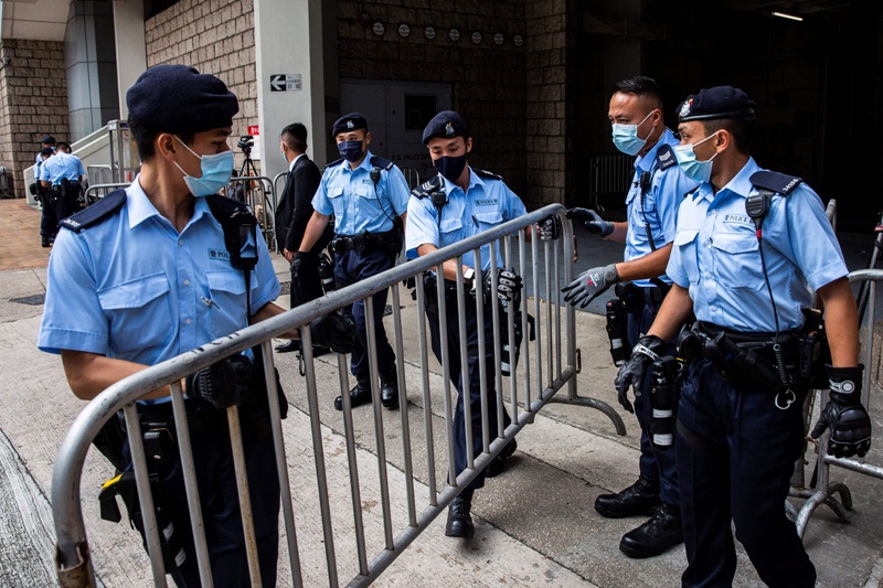 HONG KONG: Police set up barriers outside the High Court in Hong Kong yesterday, as Tong Ying-kit faces mitigation before sentencing after he was convicted of terrorism and inciting secession in the first trial conducted under a national security law imposed by China. - AFPn