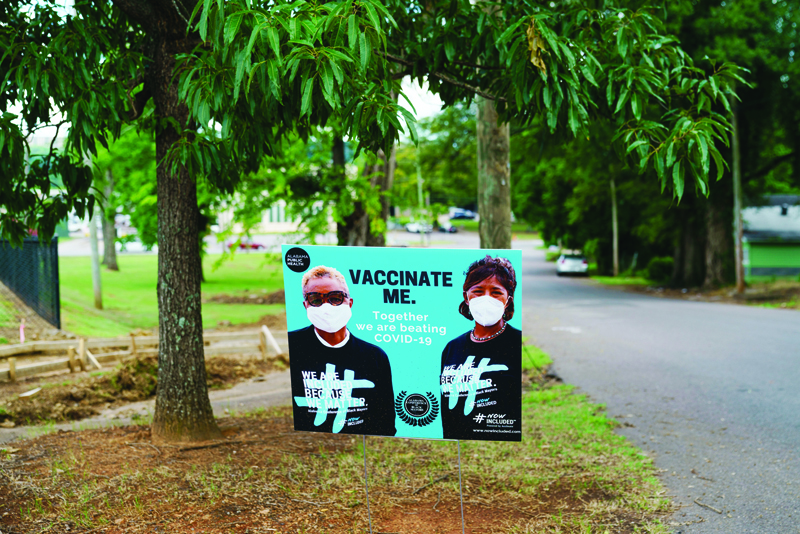 BIRMINGHAM, Alabama: A sign encouraging COVID-19 vaccination is seen outside a park. - AFP n