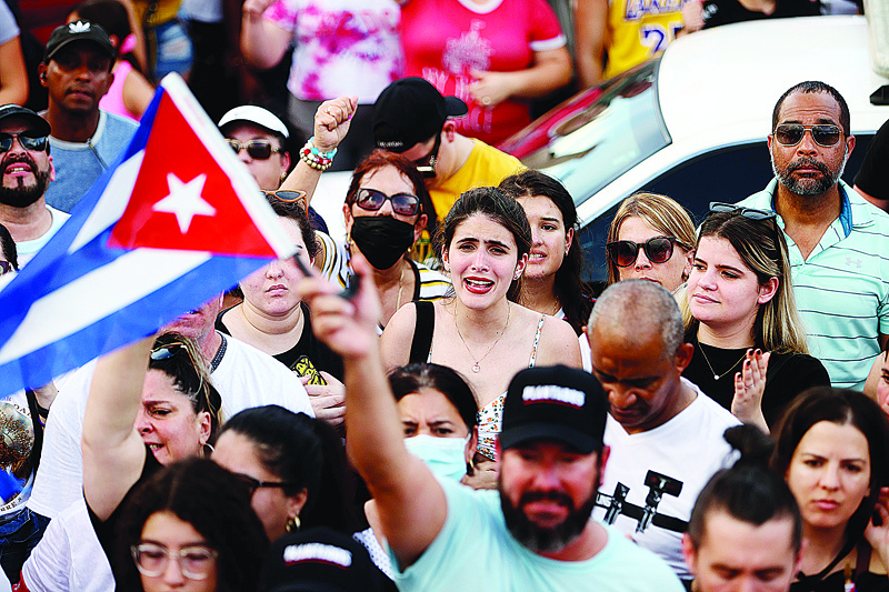 MIAMI: Protesters gather in front of the Versailles restaurant to show support for the people in Cuba who have taken to the streets there to protest on July 11, 2021 in Miami, Florida. – AFPnnn