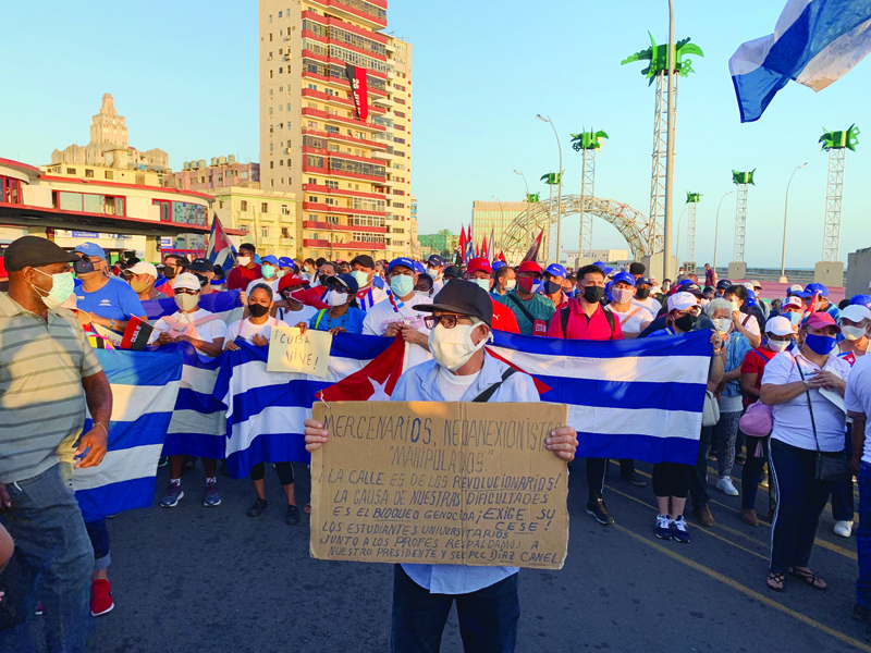 HAVANA: Supporters of the Cuban Government participate in a demonstration in Havana, yesterday. - AFPn