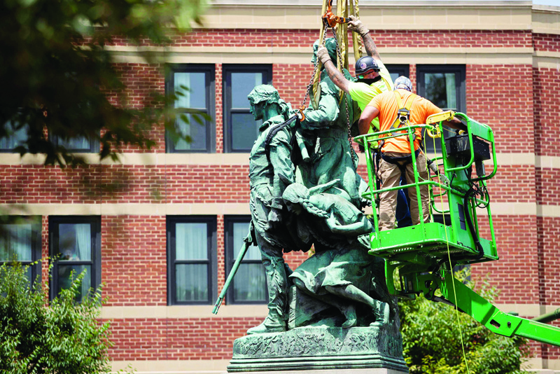 CHARLOTTESVILLE: The statue of Meriwether Lewis, William Clark and Sacagawea is removed from Charlottesville, Virginia.  - AFPnnn