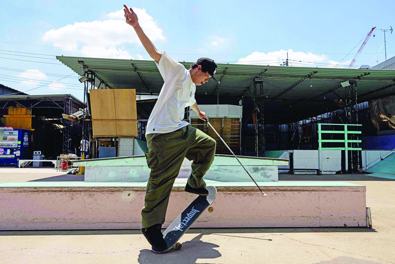 This picture taken on July 21, 2020 shows visually impaired skateboarder Ryusei Ouchi taking part in a practice session at the Haleo Skateboarding Park in Saitama in the Tokyo suburbs. – AFP n