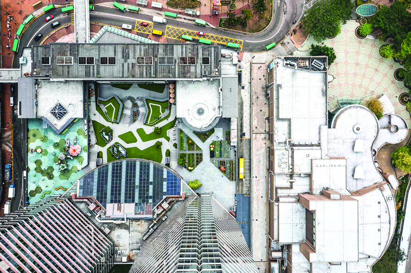 In this aerial picture, a general view shows the Sky Garden (center), a 1,200 square-meter rooftop garden on top of the Metropole Plaza shopping mall and the surrounding areas on the street level below in Hong Kong. – AFP photosn