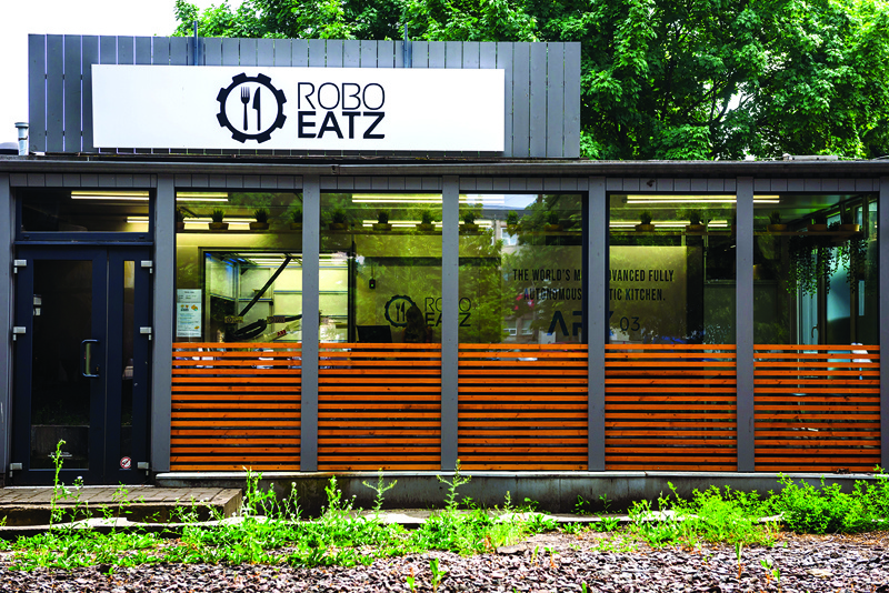 A photo shows an exterior view of the Roboeatz eatery with the company's logo in Riga. – AFP photosn