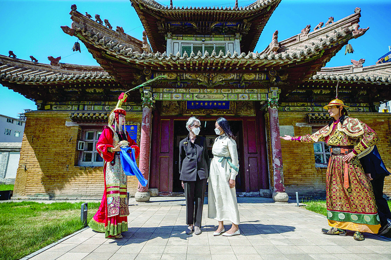 laanbaatar: Wendy Sherman (L), US Deputy Secretary of State, poses for pictures with Chinbat Nomin, Mongolian Minister of Culture at the Choijin Lama Temple Museum in Ulaanbaatar, the capital of Mongolia on July 24, 2021, during her visit to Mongolia from July 23 to 25. (Photo by Bn