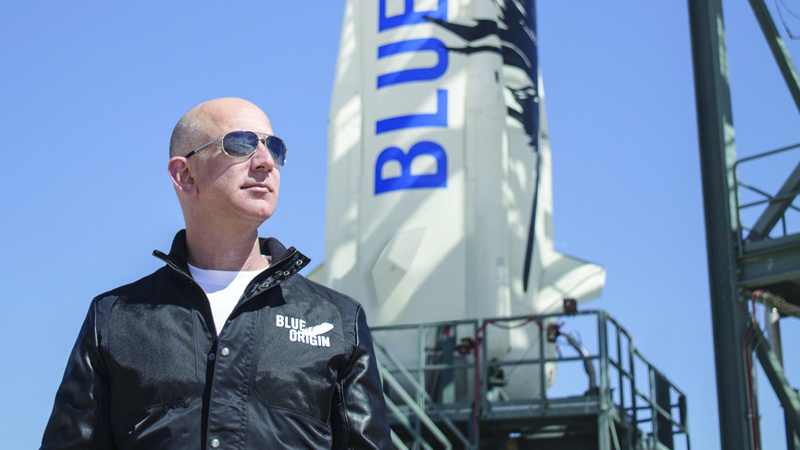 This file handout photo shows Jeff Bezos, founder of Blue Origin, at New Shepard's West Texas launch facility before the rocket's maiden voyage. - AFPnn