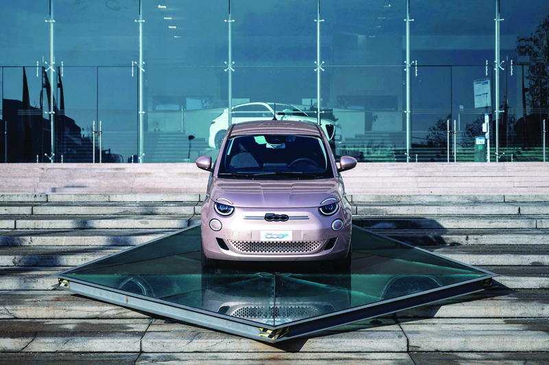 TURIN: File photo shows the Prima 500 electric car displayed at the entrance of the Italian car giant Fiat Mirafiori car plant in Turin. Diesel or petrol cars have lived but the future is electric. - AFPnnn
