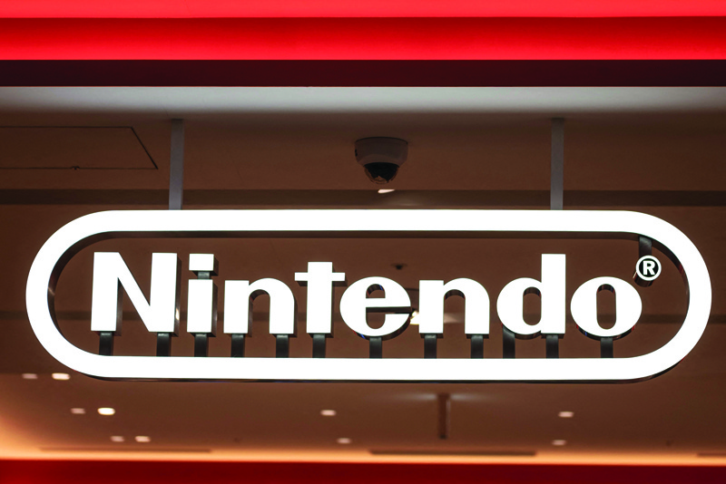TOKYO: File photo shows logo of Nintendo is pictured at its store in Tokyo. Nintendo yesterday announced its updated Switch hand-held game console would be available in October. - AFPnnnn