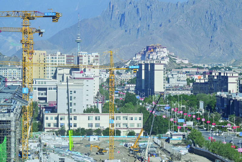 This photo taken on June 3, 2021 shows a general view of new building sites under construction in the regional capital Lhasa in China's Tibet Autonomous Region. - AFPn