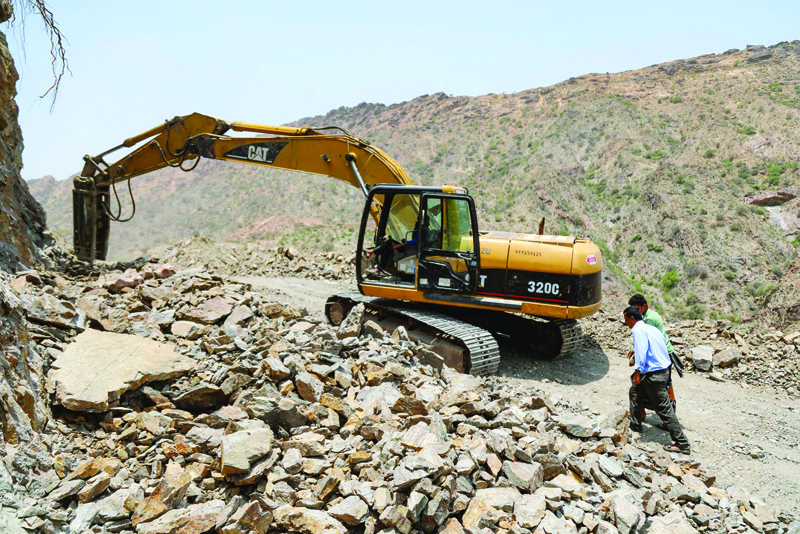 TAEZ, Yemen: This picture taken in the mountains near Yemen's third city of Taez, shows the construction of a road that will serve as a lifeline between Taez, besieged by Houthi rebels, and the southern city of Aden, the internationally recognized government's temporary capital.-AFPnn