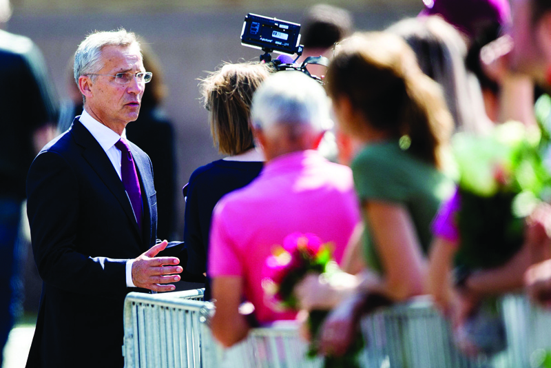 OSLO: File photo shows NATO Secretary General Jens Stoltenberg speaks with people outside Oslo's Cathedral following a memorial service on July 22, 2021, ten years after a right-wing extremist killed 77 people in twin attacks. - AFPnn