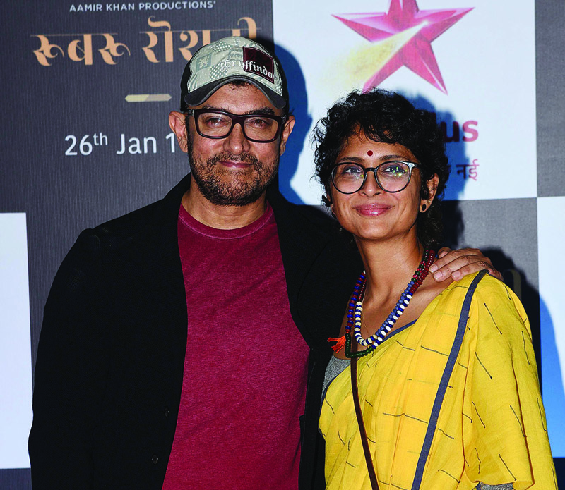 MUMBAI: In this file photo taken on Jan 21, 2019, Indian Bollywood actor Aamir Khan poses for a picture with his wife director Kiran Rao. - AFP n