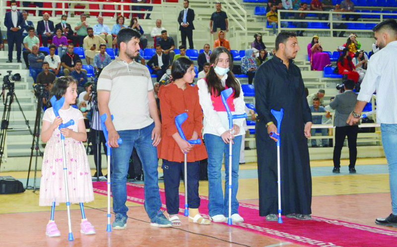 IRBIL: Amputees take part in a ceremony to mark the completion of the fitting of prosthetic limbs. - KUNA nnnnn