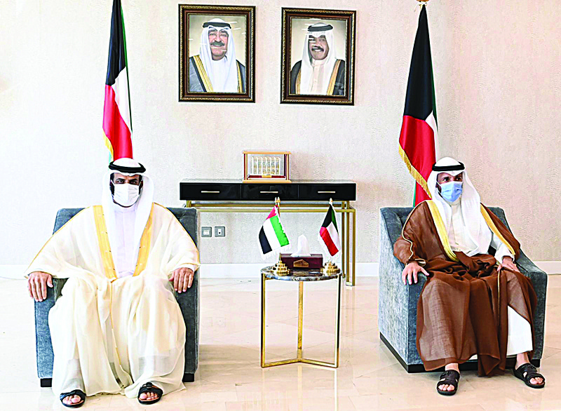 KUWAIT: National Assembly Speaker Marzouq Al-Ghanem meets the First Deputy Speaker of the Federal National Council of the UAE Hamad Al-Rahoumi. - KUNAn