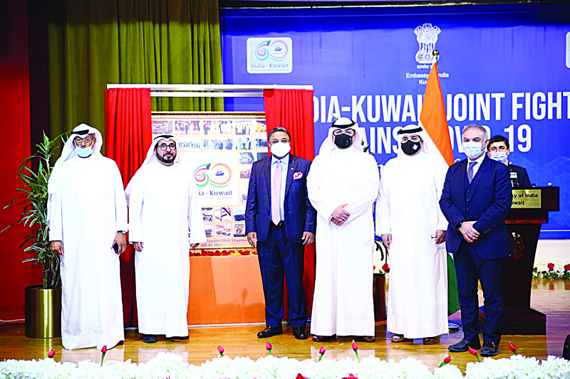 KUWAIT: A group photo of officials participating in the event.n
