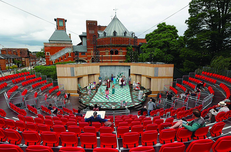Actors from the Royal Shakespeare Company rehearse scenes from the William Shakespeare play The Comedy of Errors in the Lydia & Manfred Gorvy Garden Theatre, a specially constructed outdoor performance space located in the Swan Theatre Gardens in Stratford-upon-Avon, central England. - AFP photosn