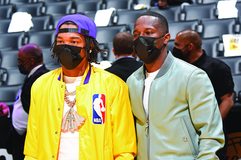 Rapper, Lil Baby and Sports Agent, Rich Paul attend a game between the Phoenix Suns and Los Angeles Lakers during Round 1, Game 4 of the 2021 NBA Playoffs at STAPLES Center in Los Angeles, California. — AFP n