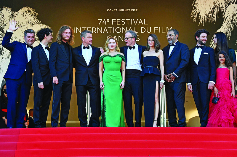 (From left) Screenwriters Thomas Bidegain and Noe Debre, French actor Idir Azougli, US actor Matt Damon, US actress Abigail Breslin, US director Tom Mccarthy, French actress Camille Cottin, actor moussa Maaskri, actor Gregory Di Meglio, producer Lisa Chasin and French actress Lilou Siauvaud pose as they arrive for the screening of the film “Stillwater” at the 74th edition of the Cannes Film Festival. - AFPn