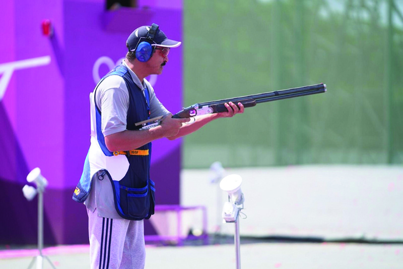 TOKYO: Kuwaiti skeet shooters Abdullah Al-Rashidi participates in the first round of Tokyo Olympics skeet qualifiers held at the Asaka Olympic fields. - KUNAn