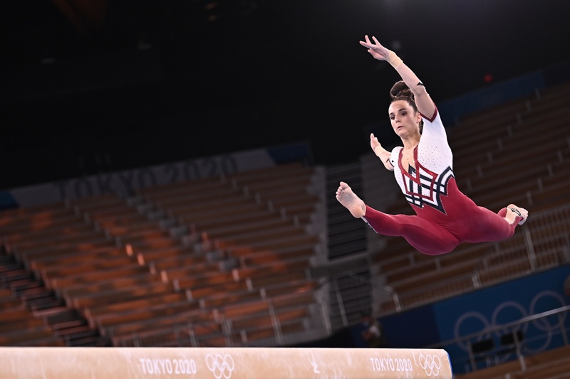 TOKYO: Germany's Pauline Schaefer-Betz competes in the artistic gymnastics balance beam event of the women's qualification during the Tokyo 2020 Olympic Games at the Ariake Gymnastics Center in Tokyo yesterday. – AFPn
