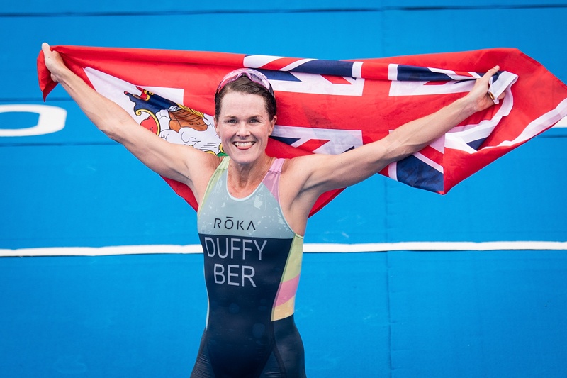 TOKYO: Bermuda's Flora Duffy celebrates after crossing the finish line to win the women's individual triathlon competition during the Tokyo 2020 Olympic Games at the Odaiba Marine Park in Tokyo yesterday. – AFPn