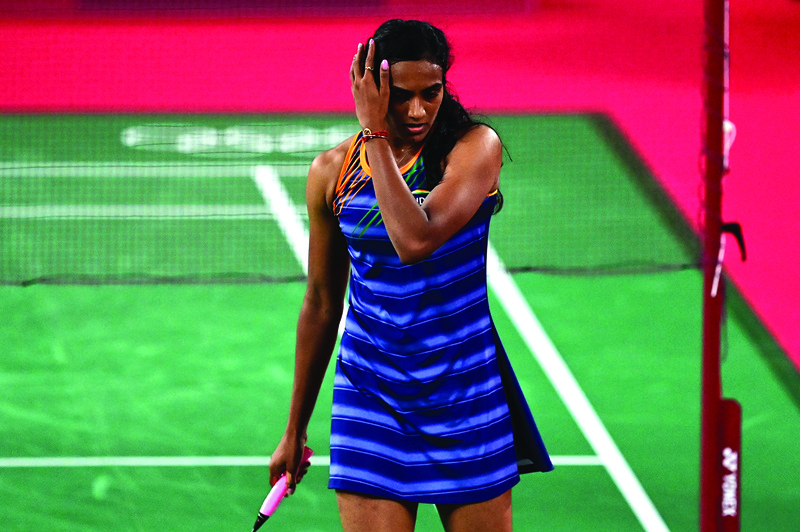 TOKYO: India's P V Sindhu reacts after a point with Taiwan's Tai Tzu-ying in their women's singles badminton semi-final match during the Tokyo 2020 Olympic Games at the Musashino Forest Sports Plaza in Tokyo yesterday. – AFPn