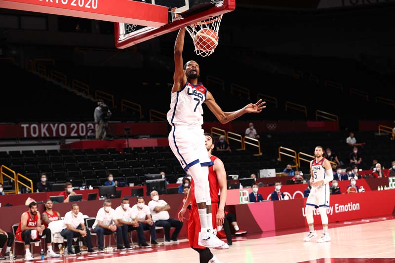 TOKYO: Kevin Durant #7 of the USA Men's National Team dunks the ball against the Iran Men's National Team during the 2020 Tokyo Olympics yesterday at Saitama Super Arena in Tokyo, Japan. – AFP n
