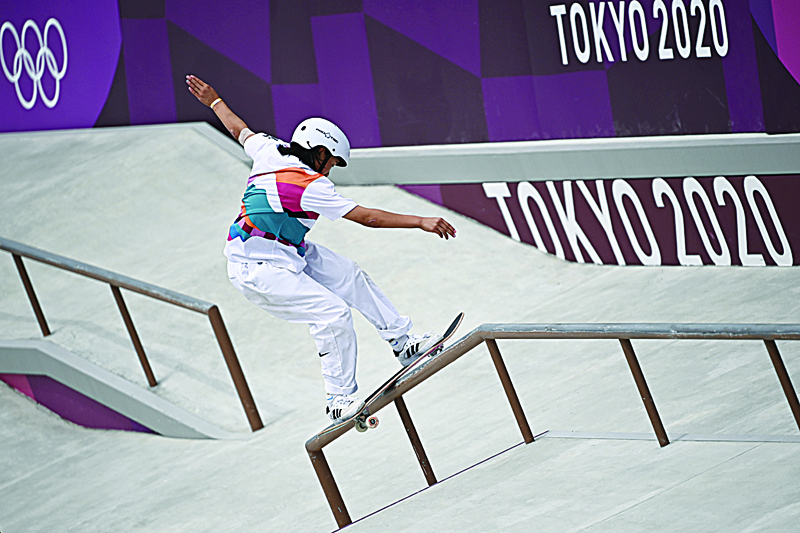 TOKYO: Japan's Momiji Nishiya competes in the skateboarding women's street final of the Tokyo 2020 Olympic Games at Ariake Sports Park in Tokyo yesterday. - AFPn