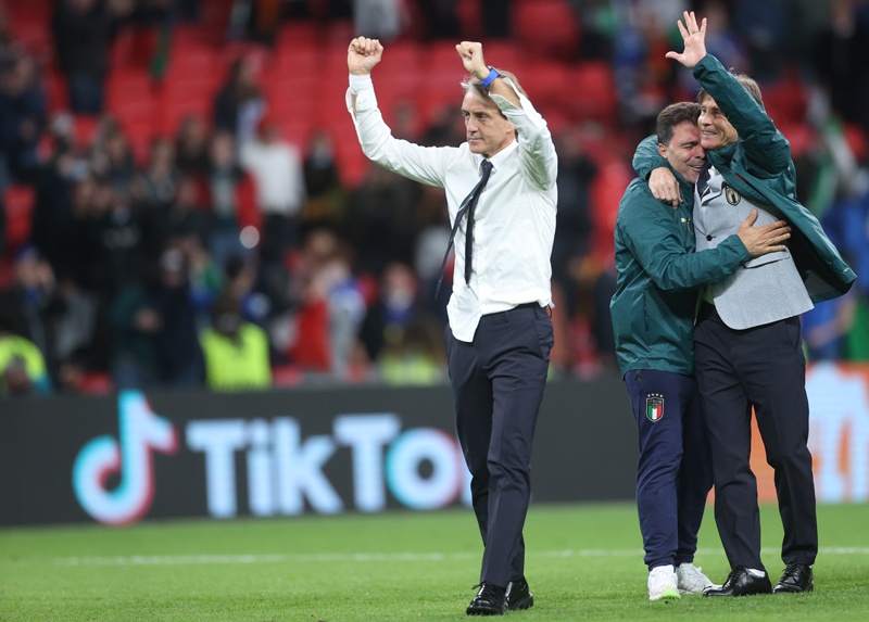 LONDON: Italy's coach Roberto Mancini celebrates after winning the Euro 2020 semi-final football match between Italy and Spain at Wembley Stadium in London on Tuesday. – AFPnn