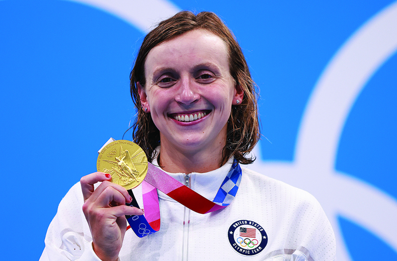 TOKYO: Gold medalist USA's Kathleen Ledecky poses on the podium after the final of the women's 1500m freestyle swimming event during the Tokyo 2020 Olympic Games at the Tokyo Aquatics Centre in Tokyo yesterday. – AFPn
