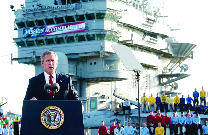 SAN DIEGO, US: US President George W Bush addresses the nation aboard the nuclear aircraft carrier USS Abraham Lincoln 01 May, 2003, as it sails for Naval Air Station North Island, San Diego, California. --  AFPnn