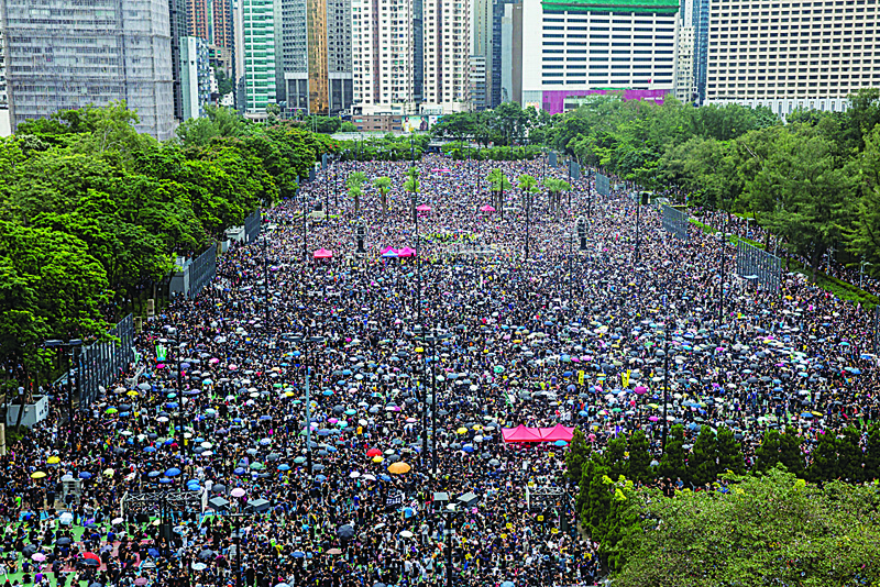 HONG KONG: In this file photo, protesters gather for a rally in Victoria Park in Hong Kong, in opposition to a planned extradition law that had morphed into a wider call for democratic rights in the semi-autonomous city. - AFPn