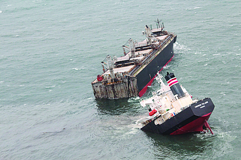 HACHINOHE, Japan: The Panamanian-registered Crimson Polaris ship running aground in Hachinohe, Aomori prefecture yesterday.-AFPn